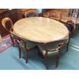 A Victorian mahogany oval tilt top breakfast table on carved quadrupedal base and six assorted