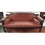 A 19th century rosewood framed settee on shaped octagonal supports Condition Report:Available upon