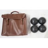 A set of four lawn bowls, in a Slazenger vinyl carry-case Condition Report:Available upon request