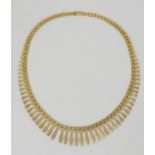 A 9ct gold retro fringe style necklace, length 41cm, weight 18gms Condition Report:Available upon