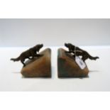 A pair of spelter dog and onyx bookends Condition Report:Available upon request