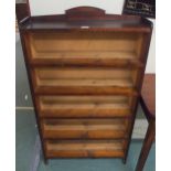 A 20th century stained pine open bookcase, 124cm high x 70cm wide x 21cm deep Condition Report: