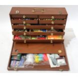 FISHING TACKLE A multi-drawer collector's case, containing an array of fly-tying tools and materials