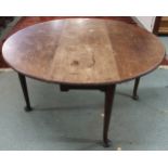 A Victorian mahogany circular topped drop end table on Queen Anne legs, 72cm high x 134cm long (46cm