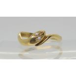 A 9ct gold snake shaped ring with diamond eyes, size N1/2. Weight 1.6gms Condition Report: