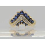 A 14k yellow gold sapphire and diamond accent 'V' ring, size L1/2, weight 3.5gms Condition Report: