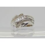 A 9ct white gold diamond dress ring set with estimated approx 0.50cts of baguette and brilliant