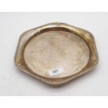 A George V silver dish, of shaped hexagonal form, with a moulded decorative border, by R F