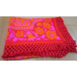 A large Casa Pupo bed cover/floor rug in shades of magenta and orange Condition Report:Not available