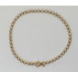 A 14k gold diamond line bracelet, set with estimated approx 0.25cts of brilliant cut diamonds,