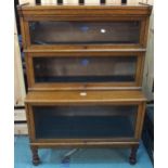 A 20th century oak Peter Graham sectional bookcase, 127cm high x 87cm wide x 37cm deep Condition