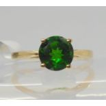 A 10k gold Russian diopside set ring, finger size J1/2, weight 1.5gms Condition Report:As new with