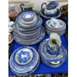 A large quantity of blue and white transfer printed ceramics, mainly Willow pattern Condition