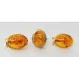 A pair of 14k gold amber, post and clip earrings, weight 3.5gms together with a 9ct gold similar