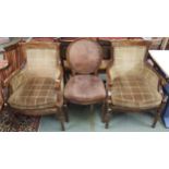 A pair of 20th century oak framed tub chairs with patterned velour upholstery and another oak framed