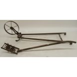 A 19th century cast iron and beech seed drill and a beech and iron hand plough (2) Condition