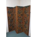 A 20th century four fold room divider with floral foliate tapestry panels, each panel is 172cm