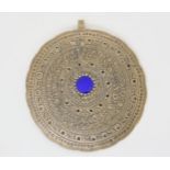 A large ethnic plaid brooch, possibly Mexican, set with a blue glass rondel Condition Report:Not