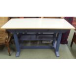 A 20th century two drawer kitchen work table with white top on painted base, 76cm high x 141cm