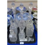 Three matching decanters and assorted others Condition Report:Not available for this lot.