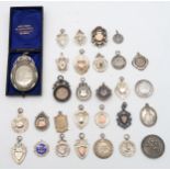 A large collection of mainly silver medals, badges and fobs, to include a large white metal cased