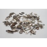 A collection of loose silver, white metal and EPNS items including a silver brooch with applied