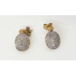 A pair of pave diamond earrings (af) weight 2.5gms Condition Report:One of the earring posts needs