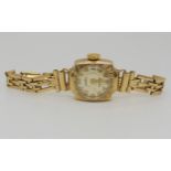 A ladies 9ct gold Roamer watch and strap, weight together including mechanism 11.4gms Condition
