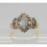 A 9ct champagne and white diamond cluster, set with estimated approx 0.60cts of brilliant and