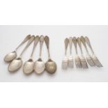 A part suite of silver pointed end cutlery, comprising six forks, four serving