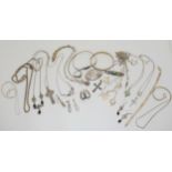 A collection of silver and white metal items to include chains and pendants Condition Report:Not