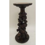 A Victorian mahogany marble topped torchiere stand with carved cherub pedestal, 75cm high