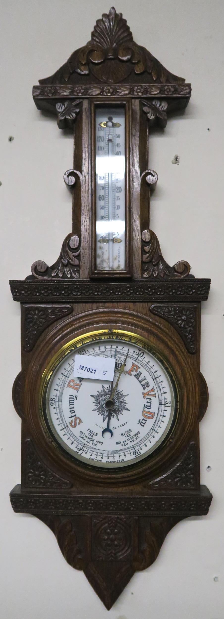 A 20th century carved oak barometer/thermometer and brass framed circular wall mirror (2) - Image 2 of 8