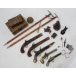 A mixed lot, to include various replica flintlock pistols, souvenir mountaineering axes, a conical