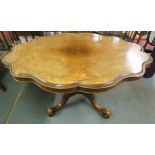 A Victorian burr walnut shaped tilt top breakfast table on carved quadrupedal base, 79cm high x