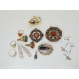 Three Scottish agate brooches, a silver citrine ring stamped Iona and other items Condition Report:
