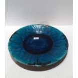 A French pottery platter glazed in turquoise and black by JR Forget, Eze, 40cm diameter Condition