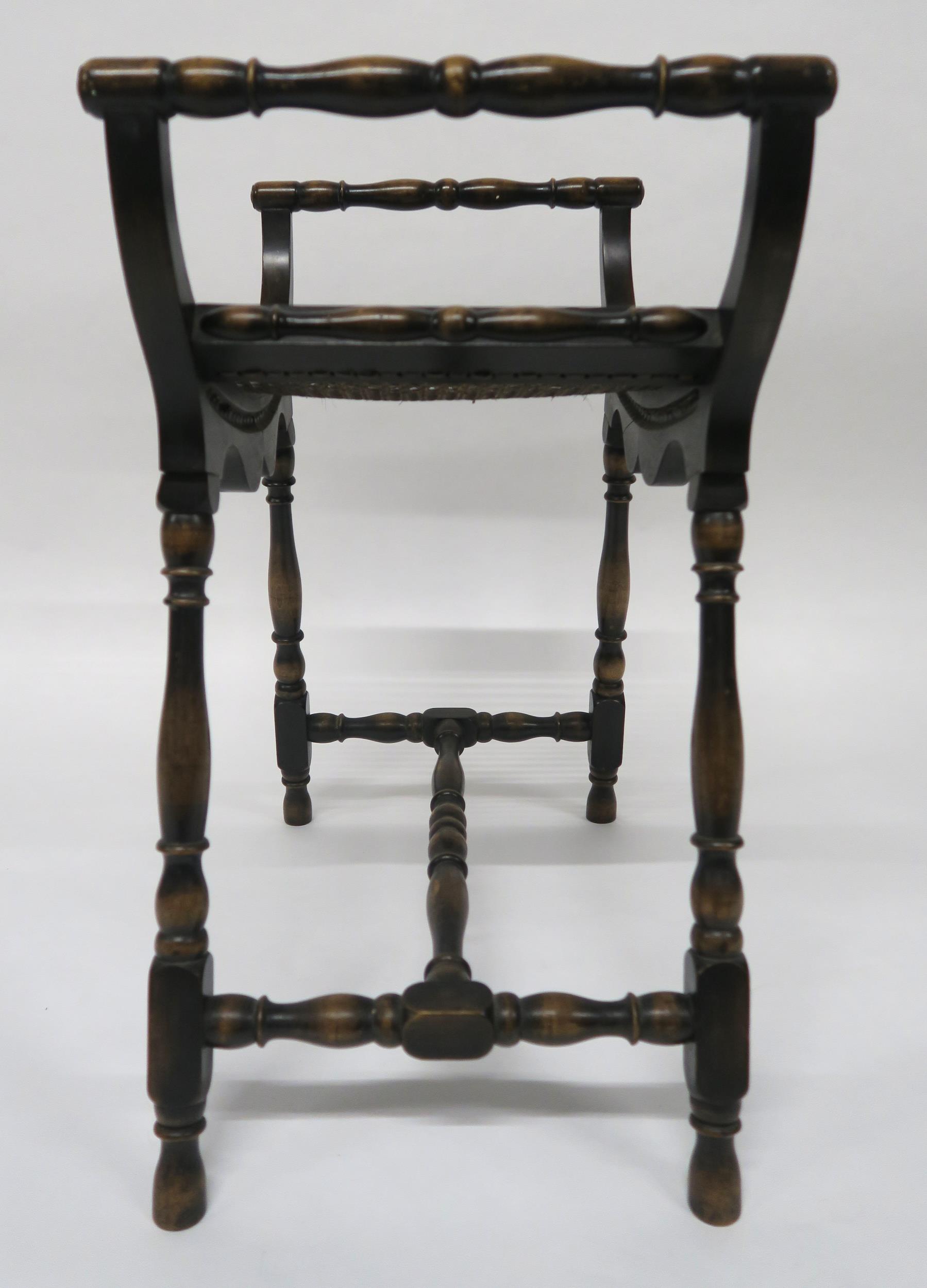 A 20th century mahogany bergere stool with turned arms and stretchered supports, 69cm high x 59cm - Image 3 of 4