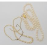 A string of child's communion seed pearls with a yellow and white metal clasp (af) together with a