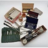 A quantity of vintage medical equipment, including a glass vessel in treen screw-top case,