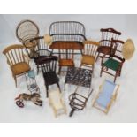 A varied collection of dolls' furniture, to include a hoop-back Windsor settee, good quality elm