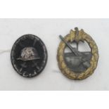 A WW2 German Kriegsmarine Coastal Artillery badge, marked "FLL 43" verso; and a WW2 German Black