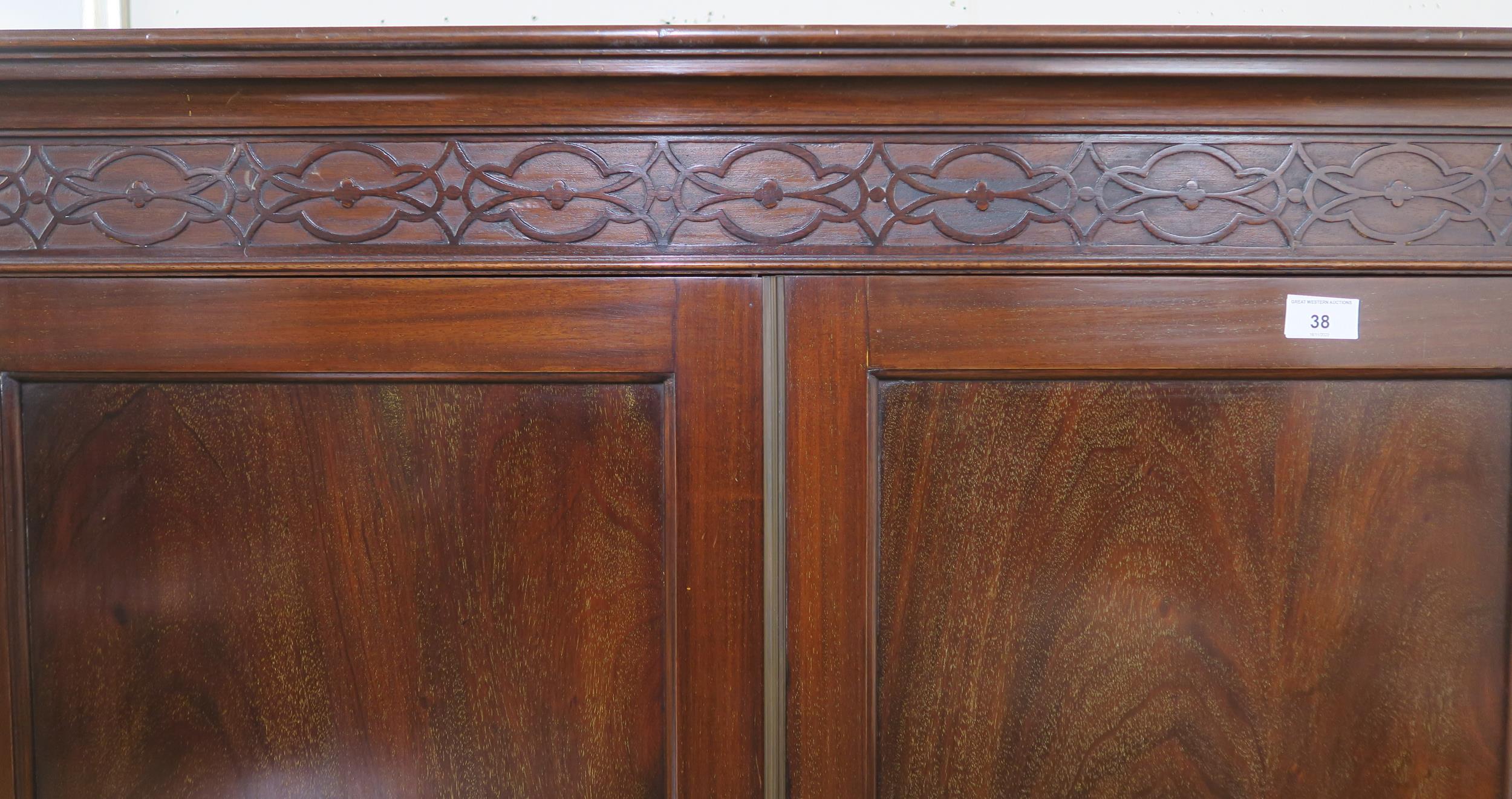 A 20th century mahogany wardrobe with moulded cornice over pair of panel doors on bracket base, - Image 2 of 6