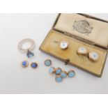 A collection of vintage buttons and a silver designer made ring set with a blue gem Condition