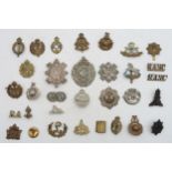 Assorted military cap and collar badges, to include the Black Watch, Argyle and Sutherland