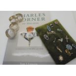 A collection of Charles Horner jewellery and serviette rings, together with a book on Charles Horner