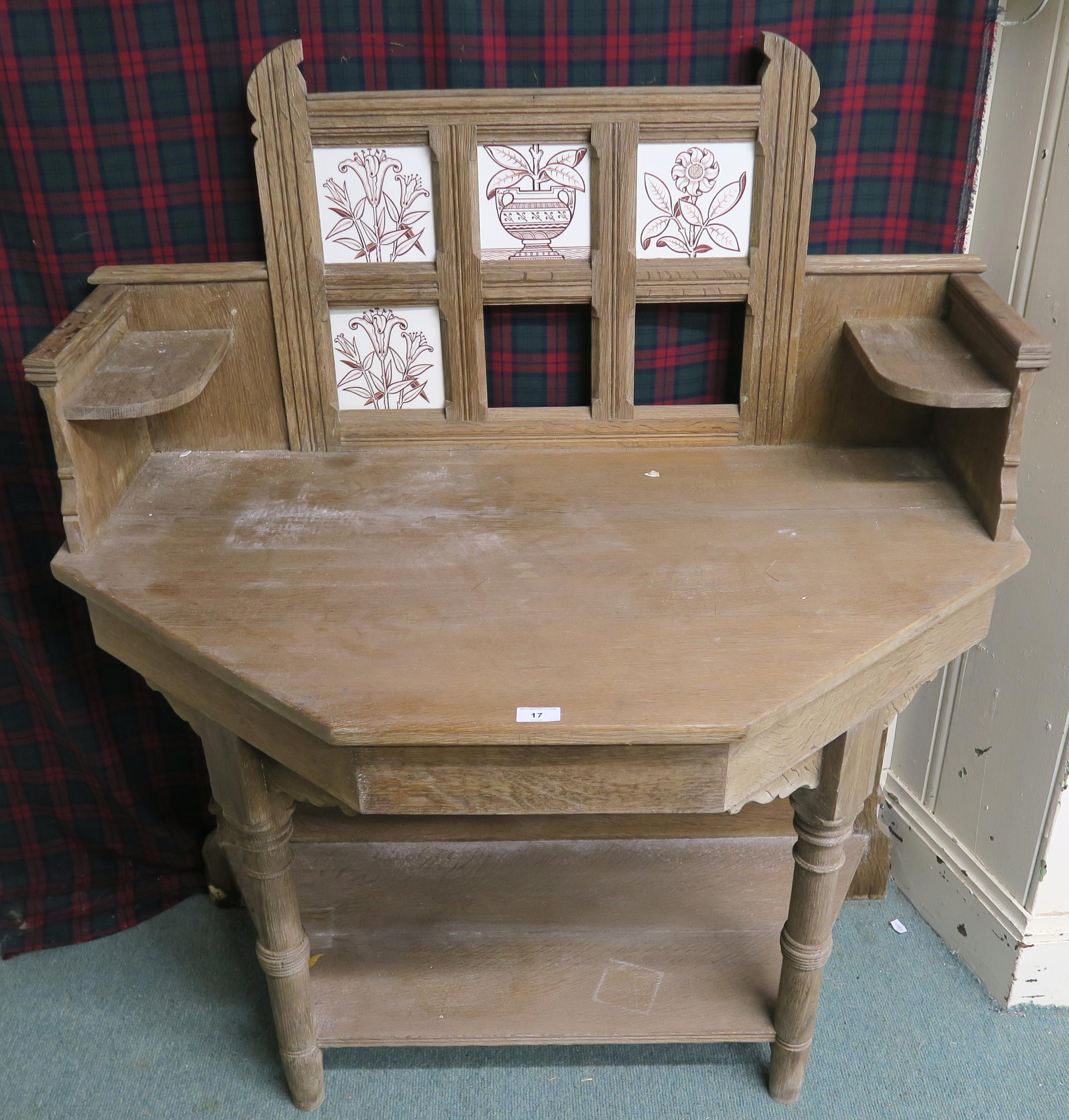 A Victorian pine tile backed washstand with turned uprights, 125cm high x 105cm wide x 61cm deep