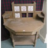 A Victorian pine tile backed washstand with turned uprights, 125cm high x 105cm wide x 61cm deep