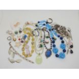 A silver lapis lazuli pendant and beads, gemstone set silver rings, and other items Condition