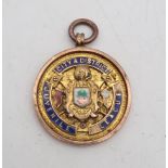 A 9ct gold football medal for the Glasgow & District Juvenile League, engraved verso "Championship